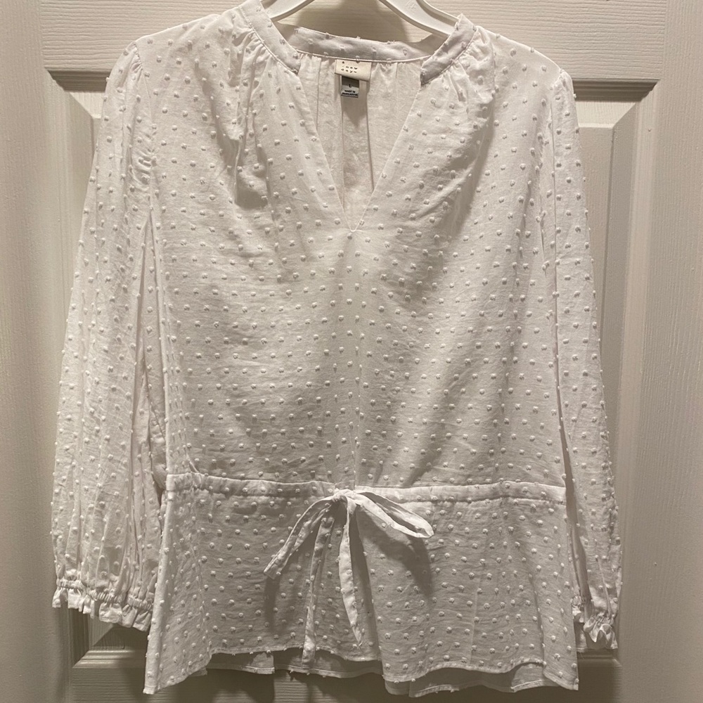 White long sleeve top
